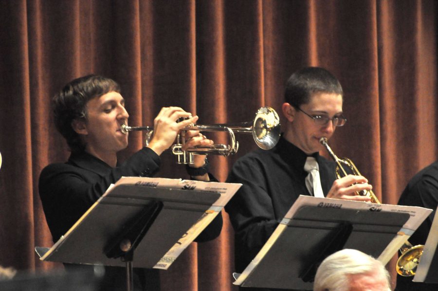 Junior Andrew Checki and sophomore Wes Killion performed their trumpet solos during the fall concert in Akin Auditorium. 
Photo by KERRI CARTER
