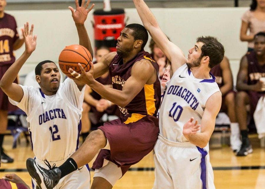Kevin Grayer attempts a layup against Ouachita Baptist University. The senior guard averages 10 points per game.