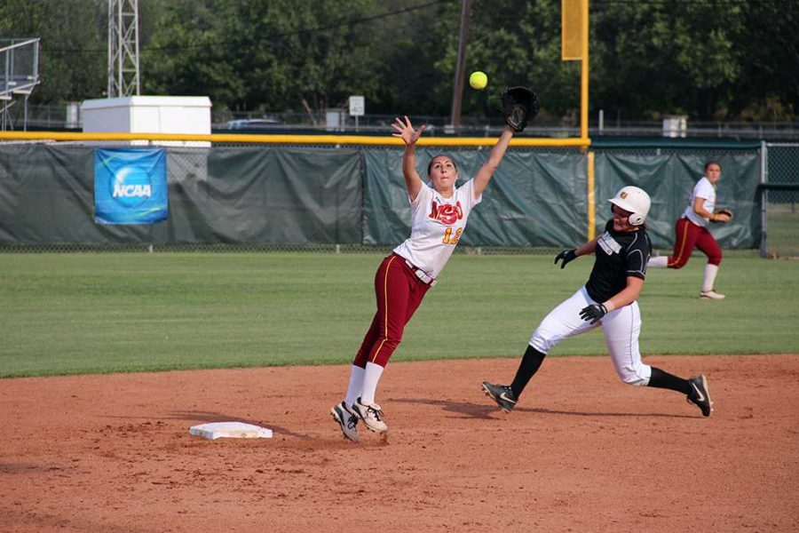 Carey Campbell, Senior jumps to catch the ball while a Cameron runner makes it to second Tuesday April 16.
Photo courtesy of Lauren Roberts