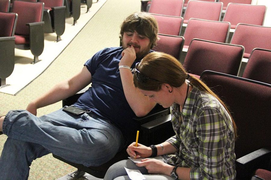 (From Right) UPB officers Bailey Hess, Senior Criminal Justice and sociology double major sits with Tanner Sanders, Freshman, Sociology major before their Walking Dead/Game of Thrones watch party begins Sunday night.