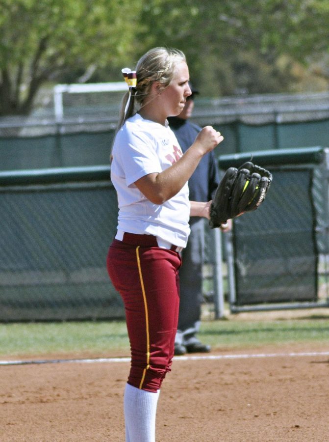 Freshman Kat Batey, takes a moment to concentrate while pitching against Central Oklahoma Bronchos. She currently studies Excercise Physiology at MSU. She pitched for 6 innings and she got 11 hits, 6 runs, 4 earned runs, 4 walks, 1 homerun, 1 hbp