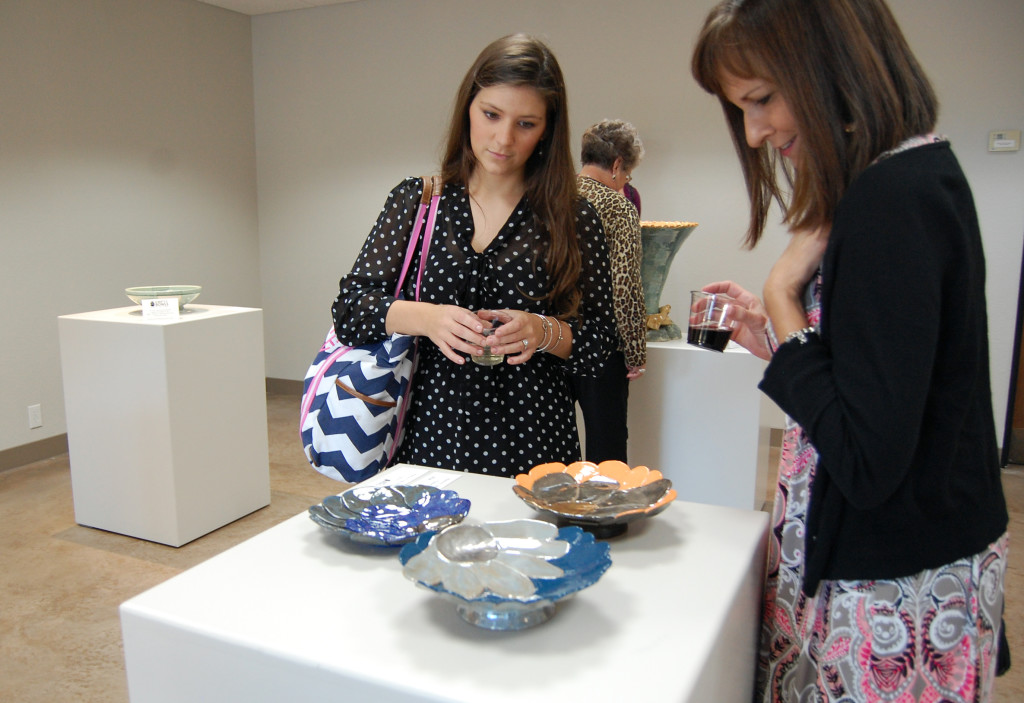 Hollis Kauffman, graduate student in counseling, participates in Empty Bowls Ceramic Exhibit Reception at the Wichita Falls Museum of Arts. Empty Bowls is a community-wide program to help the local Food Bank raise as much money as possible for the growing hunger issue in Wichita Falls. This event is part of an international program that has raised millions of dollars for the battle against hunger and starvation. Kauffman said, "Seeing me our community comes together is such a wordy cost, and it is really inspiring."