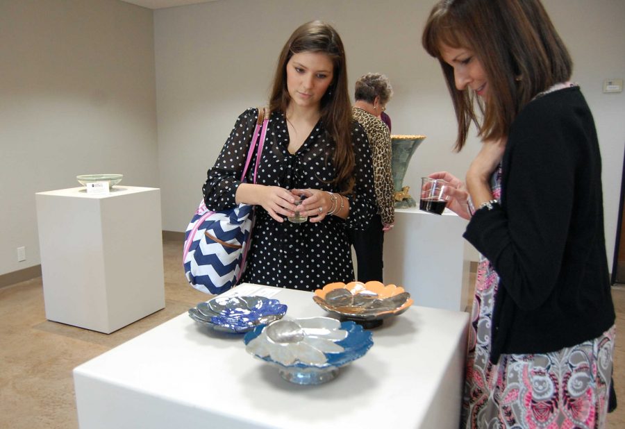 Hollis Kauffman, graduate student in counseling, participates in Empty Bowls Ceramic Exhibit Reception at the Wichita Falls Museum of Arts. Empty Bowls is a community-wide program to help the local Food Bank raise as much money as possible for the growing hunger issue in Wichita Falls. This event is part of an international program that has raised millions of dollars for the battle against hunger and starvation. Kauffman said, Seeing me our community comes together is such a wordy cost, and it is really inspiring.