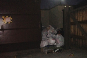 Trash piled up next to the dumpsters at Sundance Court Monday night Jan. 20.