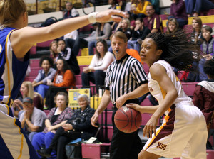 Janae McJunkins, undecided senior, looks for a open passing lane during MSU's win over Texas A&M-Kingsville Jan. 25.