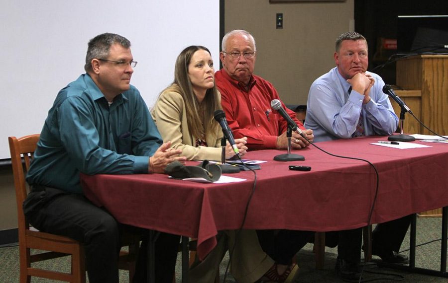 Daniel Nix, utility operation manager, Teresa Rose, asstiant director of public works, Gary Walker, SOAR representative, and Chris Horgen, KAUZ anchor, answer questions on the cloud seeding forum hosted by KAUZ in the Clark Student Center Shawnee Theater Saturday afternoon. Photo by Lauren Roberts