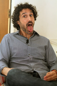 Ethan Zohn sticks out his tongue while he answers questions before his lecture April 3 in Akin Auditorium for the Artist Lecture Series. Photo by Lauren Roberts