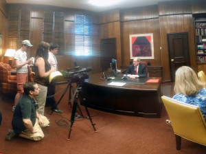 University President Jesse Rogers talks with members of the media May 9 in his office after announcing his resignation to the Board of Regents. Photo by Lauren Roberts.