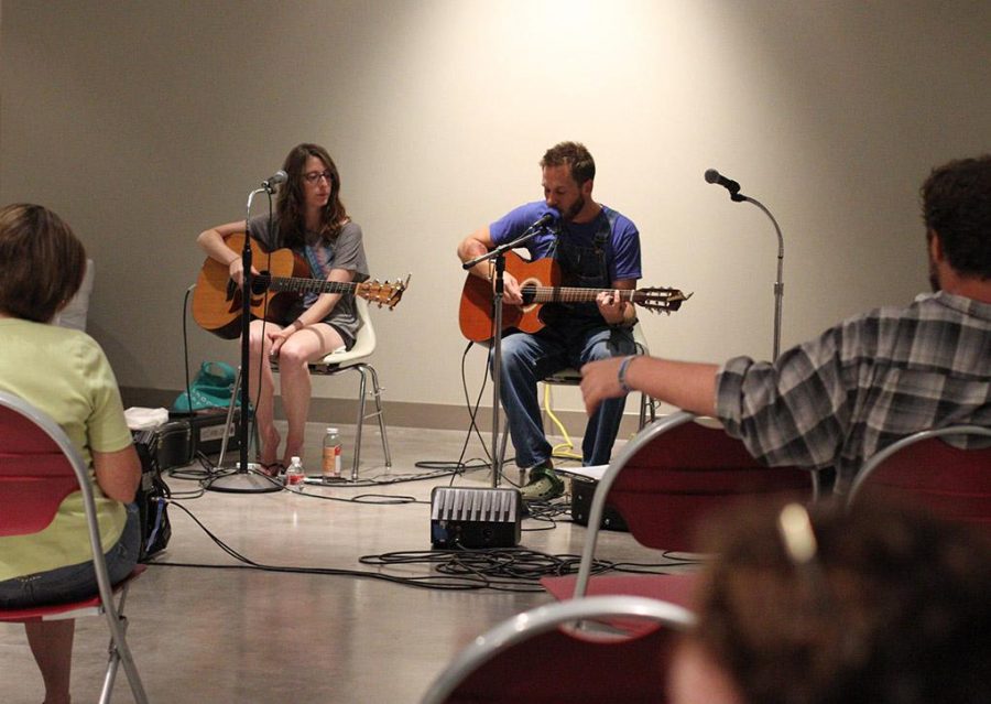 Americana folk-rocker Richie Bates and Austin-based Ali Holder perform at Live at the Lake Thursday. The rain forced the event to be moved inside the Wichita Falls Museum of Art at Midwestern State University to the Mac and Connie Cannedy Hall. Photo by Lauren Roberts