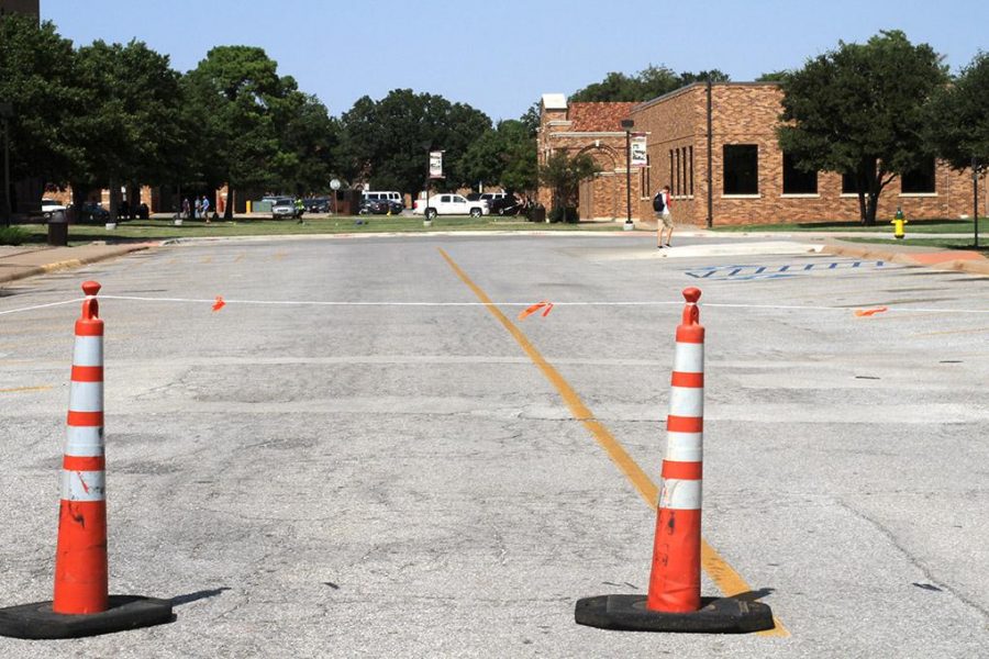 The parking lot between Prothro-Yeager and Pierce Hall sits empty while it waits for construction to begin. The parking lot will be turned into another green space with only trucks allowed access to dropoff supplies to food services. Photo by Lauren Roberts