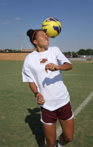 Destinee Williamson, criminal justice freshman, poses on the soccer field Tuesday. Photo by Lauren Roberts