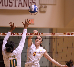 Kat Molloy, exercise physiology senior, spikes the ball in a loss to Arkansas Tech, 3-2, Saturday afternoon at D.L. Ligon Coliseum during the MSU Hampton Inn-vitational. Arkansas Tech handed the team its only loss and MSU went 3-1 overall at the tournament. The first Lone Star Conference game is against Tarleton State University the Friday at 5p.m. at D.L. Ligon Coliseum. On Saturday the team plays Angelo State University at noon and Harding University at 5:30p.m. at Ligon. Photo by Lauren Roberts