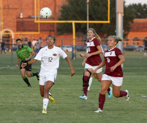 Destinee Williamson, criminal justice freshman, watches as the ball falls against Southern Nazarene University Tuesday at the MSU Soccer Field. Photo by Lauren Roberts