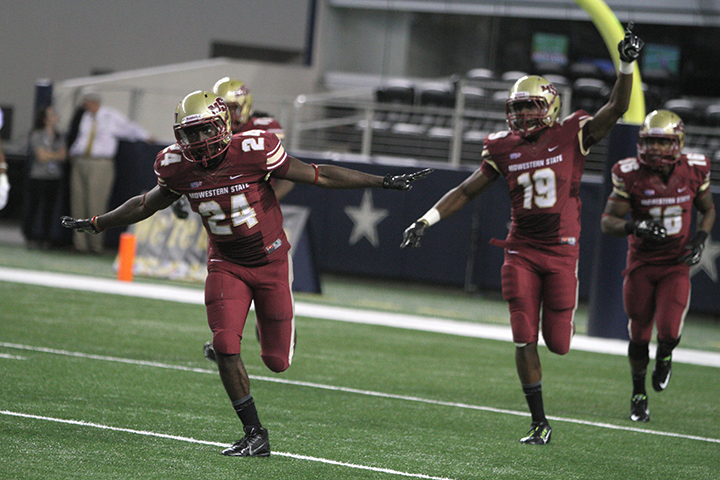 Statron Jones celebrates after his 68-yard touchdown pass at Midwestern State University v. Eastern New Mexico game at AT&T Cowboys Stadium in Arlington, Sept. 20, 2014. Photo by Lauren Roberts