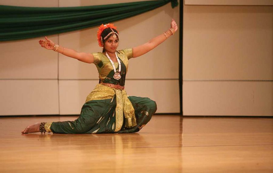 Pragna Vemuri, a graduate student in computer science, dances Kuchipudi at the Journey of India — Diwali — festival in Akin Auditorium, Oct. 17, 2014. Photo by Sam Croft