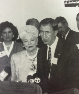During “Capital for a Day,” Louis Rodriguez introduces Governor Ann Richards and her cabinet to the media, faculty and students in the Clark Lounge. Source: Wai-Kun, 1995. Photo by Drew Myers.