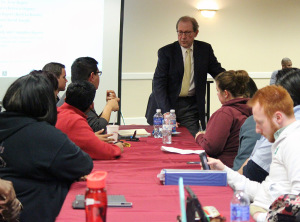 Jesse Rogers, president of Midwestern State, answers Marco Torres', senior class senator, question about future parking plans for fall of next year during the Student Government Association meeting on February 3, where close to 70 students were in attendance. Photo by Rachel Johnson