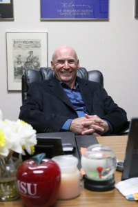 Larry Williams in his office in Bea Wood Hall. Williams has been at the helm of the study abroad program for about 30 years. Photo by Rachel Johnson.