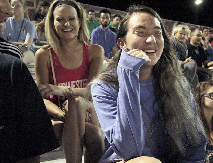 Kylie Austin, history freshman, laughs with friends at the mens soccer match between Midwestern State University and Eastern New Mexico Monday, Oct. 27, 2014 at the soccer field. Photo by Lauren Roberts