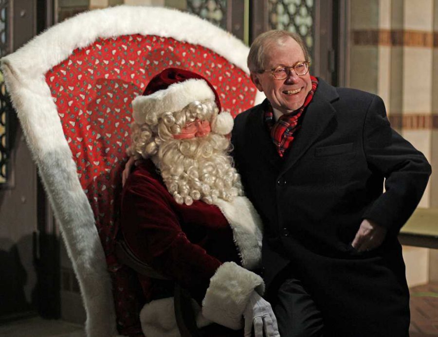 President Jesse Rogers sits on Santas lap at the Fantasy of Lights opening Dec. 10.