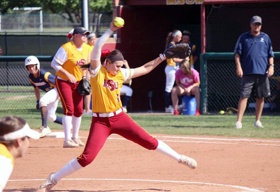 Katlyn Holmes, undecided sophomore, pitches during the MSU vs. Central Oklahoma game in Mustangs Park. The Mustangs lost with the final score 18-5. Tuesday, April 21, 2015. Photo taken by Francisco Martinez.