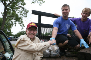  Jesse Rogers helped at the Sikes Lake cleanup Sept. 5, 2014. Photo by Bradley Wilson