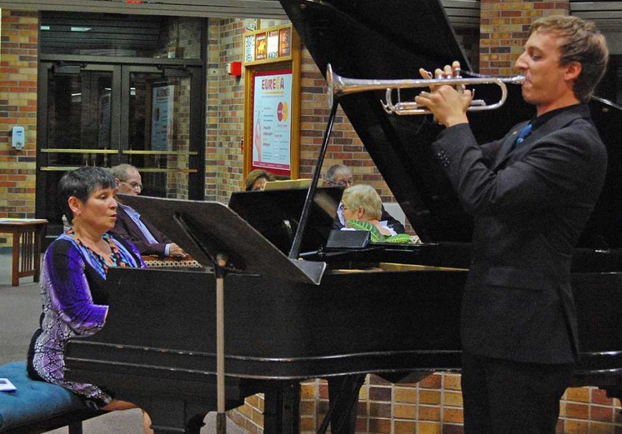 Andrew Checki, senior in music education plays trumpet Ruth Morrow's piano accompaniment on Nov. 3 at an Evening in Italy Scholarship Dinner. Morrow will play for the faculty recital May 12.