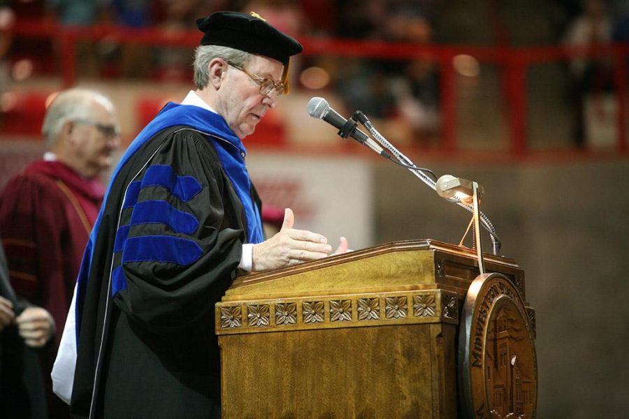 University President Jesse Rogers delivers the closing remarks at Midwestern State University graduation, May 10, 2014. As the speaker at graduation this spring, Rogers will have attended 75 MSU graduations. Photo by Ethan Metcalf