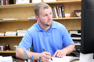 Jesse Brown, Student Government Associate president, Criminial Justice Senior, works at his desk, August 24, 2015. Photo taken by Francisco Martinez
