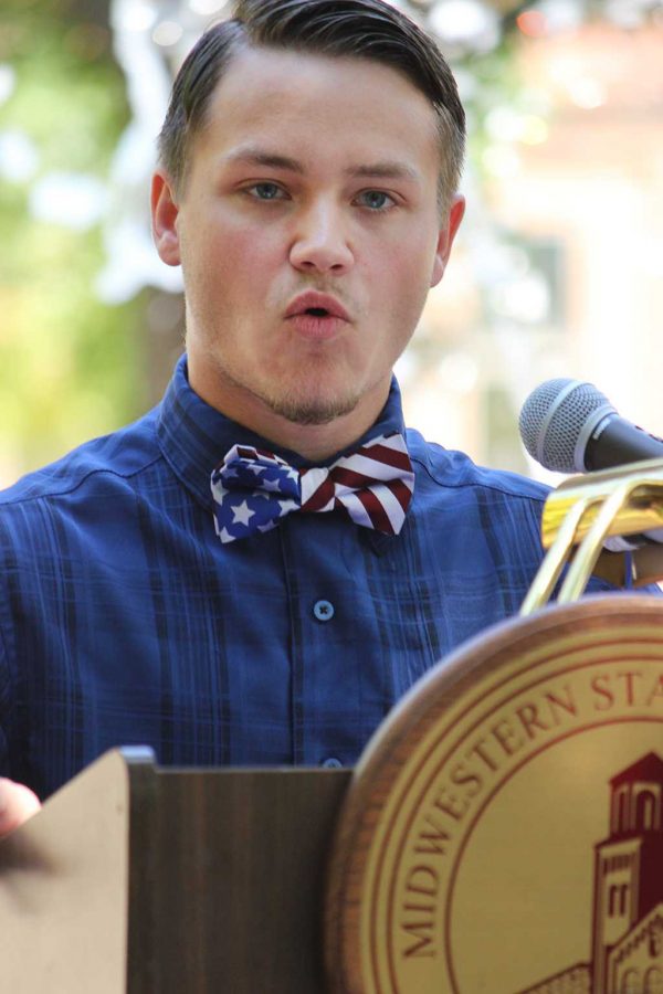 Andrew Gray, business administration and management junior, gives a speech infront of the Bolin Fountain to faculty, administrations, and students during a 9/11 Memorial put on by Student Government Association. Photo by Rachel Johnson