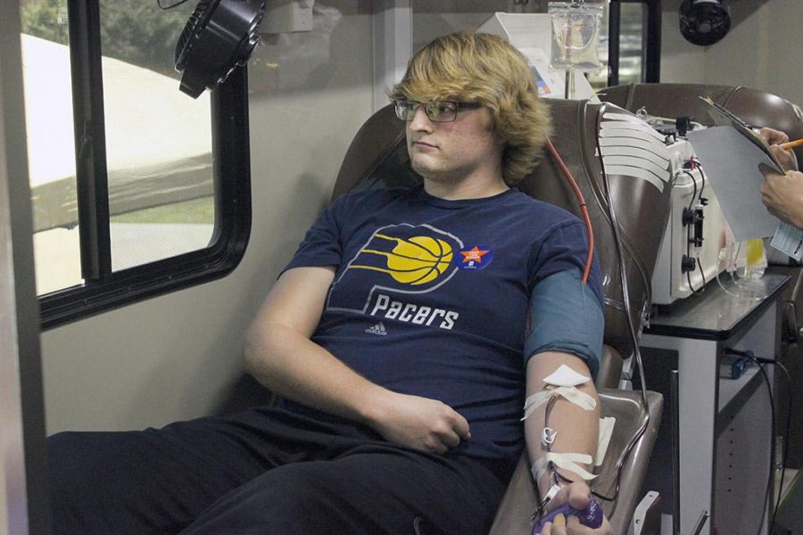 Jacob Spicer, nursing junior, donates blood at the MSU vs West Texas A&M blood drive completion in Jess Rogress memorial Oct 6. Photo by Francisco Martinez