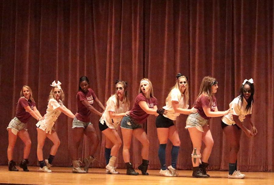 Cheerleaders perform at the Lip Sync competition held in Akin Auditorium on Oct. 27. Photo by Kayla White.