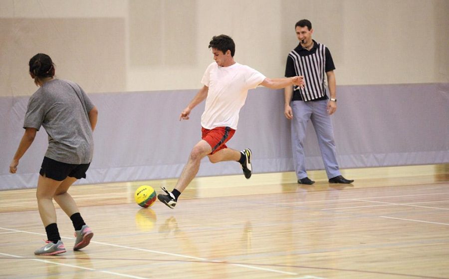 Drew Skinner, biology senior, attempts a shot at the goal in the recreational sports in the Wellness Center where TKE beat FC Mustangs 4-0, Oct. 13. Photo by Francisco Martinez