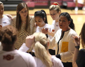 Natalie Rawson, head volleyball coach, talks to the team in a time out during the game against West Texas A&M held in D.L. Ligon Coliseum, Sept. 29. MSU lost to WTAMU 2-3. Photo by Rachel Johnson