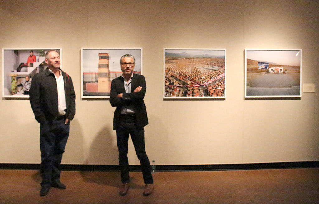 Photographers Sergio de la Torre and Javier Ramírez Limón giving an artist's statement at the opening recepetion of Existe Lo Que Tiene Nombre: Contemporary Photography in Mexico displayed at Juanita Harvey Art Gallery on March 4th. Photos by Kayla White.