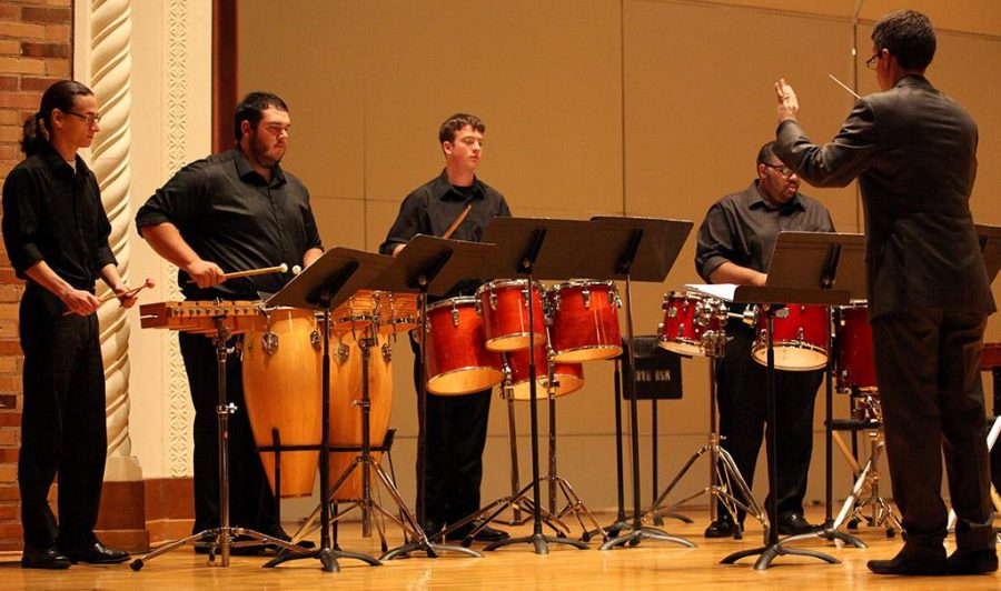 Members of the MSU percussion ensemble lead by Gordon Hicken, associate band director, perform in Akin Auditorium on April 18 with a crowd of about 120 people. Photo by Makayla Burnham