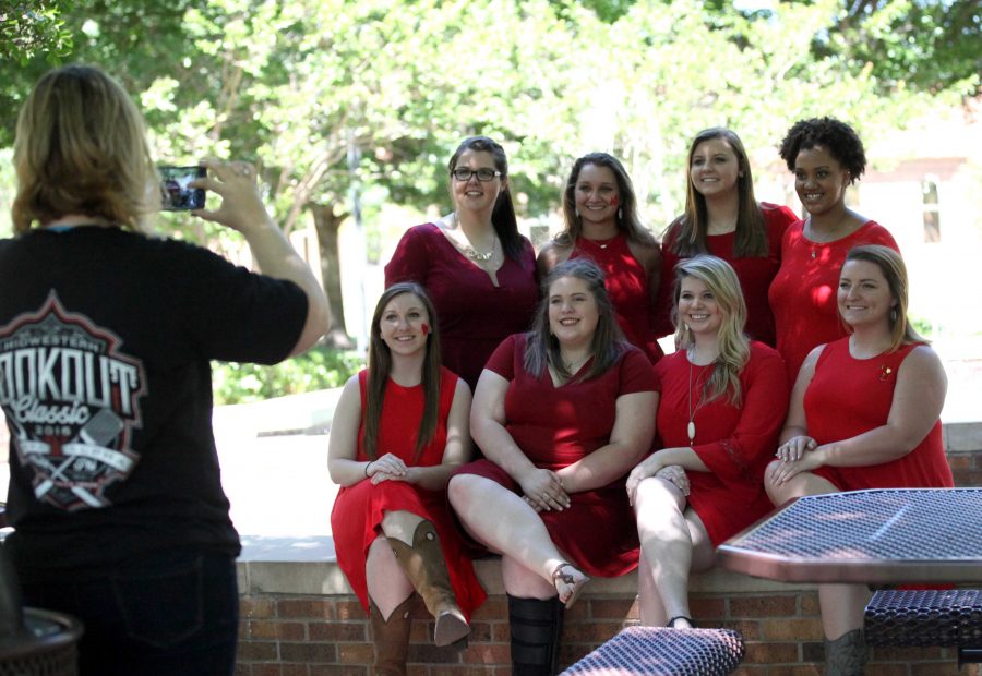 Executive officers of Alpha Phi take a picture together by Bolin Fountain in the the Quadrangle  during the Alpha Phi and Kappa Alphas annual Midwestern Cookout Classic on April 30. Photo by Makayla Burnham