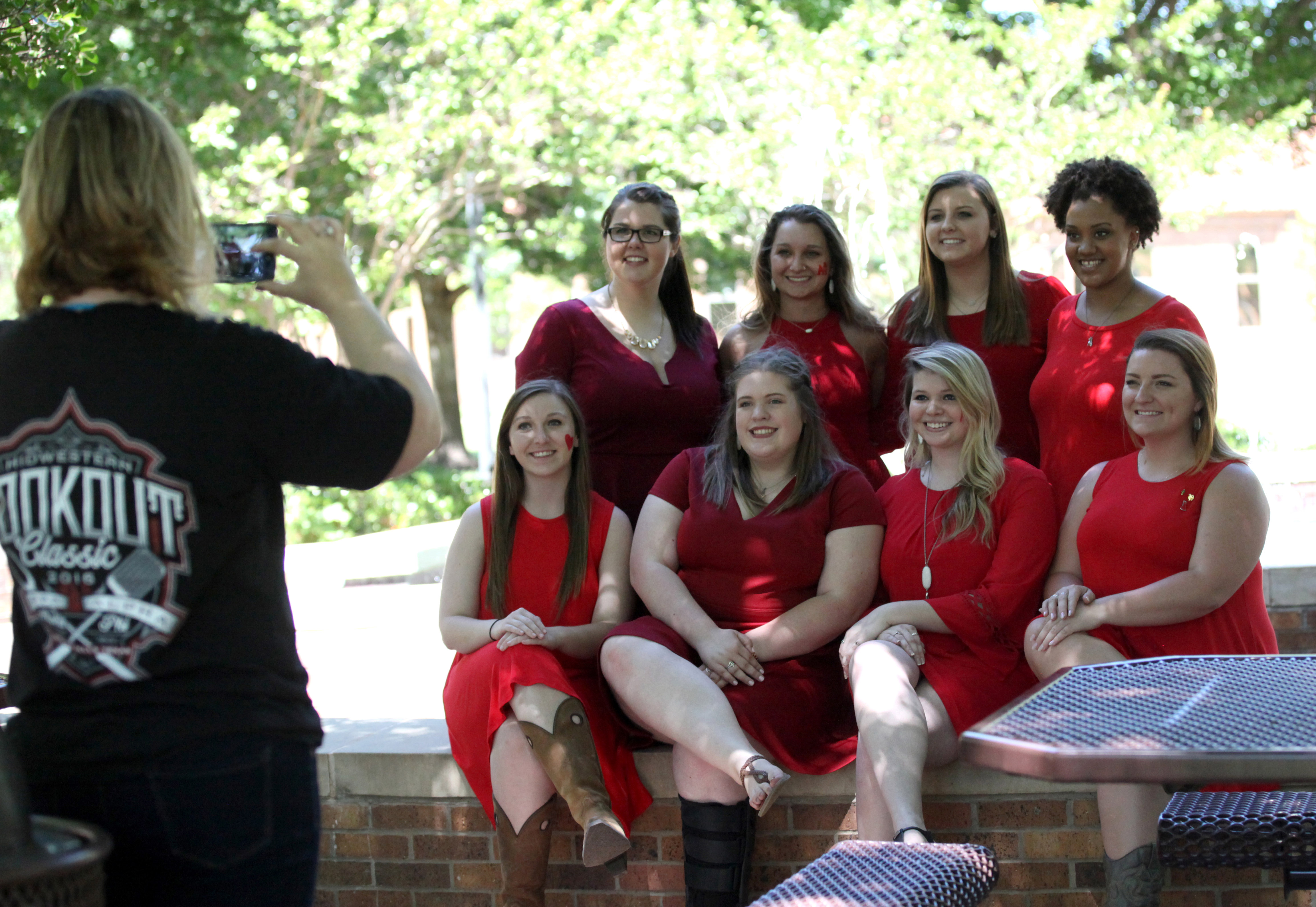 Executive officers of Alpha Phi take a picture together by Bolin Fountain in the the Quadrangle  during the Alpha Phi and Kappa Alpha's annual Midwestern Cookout Classic on April 30. Photo by Makayla Burnham