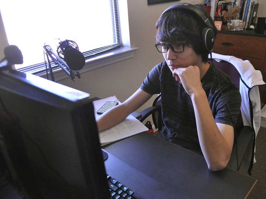 Kent Ogawa, marketing senior, utilizes the desk space in his apartment room for his large desktop, which he uses for gaming, editing, studying and just browsing the Internet. Ogawa lives in Sundance Court. May 5. Photo by Arianna Davis