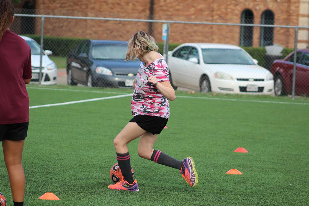 Lori William, Special Olympic athlete, makes a goal attempt during her assessment. Photo by Jeanette Perry