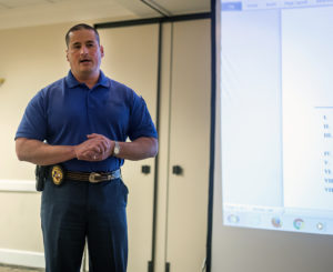 Police Chief Patrick Coggins discusses campus carry at the first SGA meeting Oct. 4. Photo by Izziel Latour
