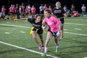 Delaine O'Connell, nursing freshman and member of Chi Omega, played flag football on Oct. 11. Chi Omega beat Gamma Phi Beta 32-20. Photo by Izziel Latour