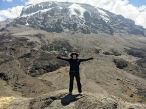 Andrea Hoffman-Watson, alum, standing on Mt. Kilimanjaro. Photo contributed by Andrea Hoffman-Watson