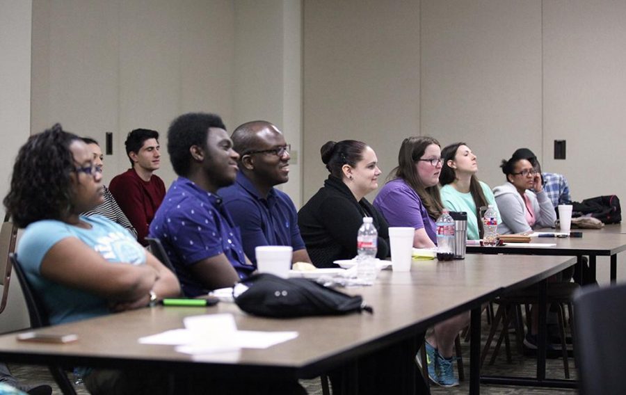A crowd of approximately 25 show up to watch students give their presentations during the 11th Annual Redwine Honors Program Symposium on March 25. Photo by Arianna Davis