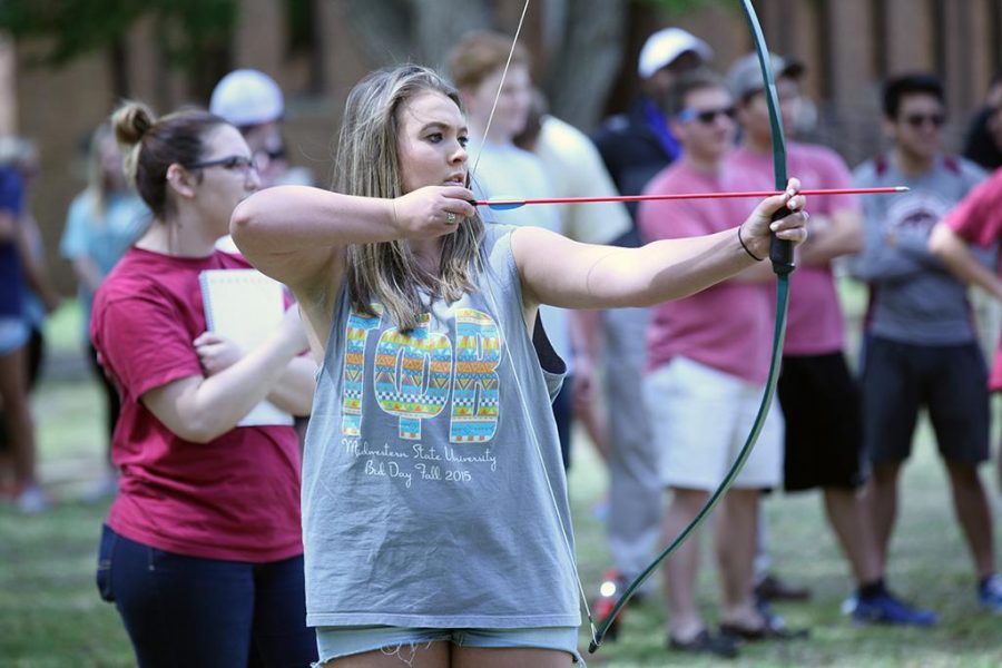 Lily McCutchon, member of Gamma Phi Beta, participates in Greek Week 2016. Photo by Topher McGehee