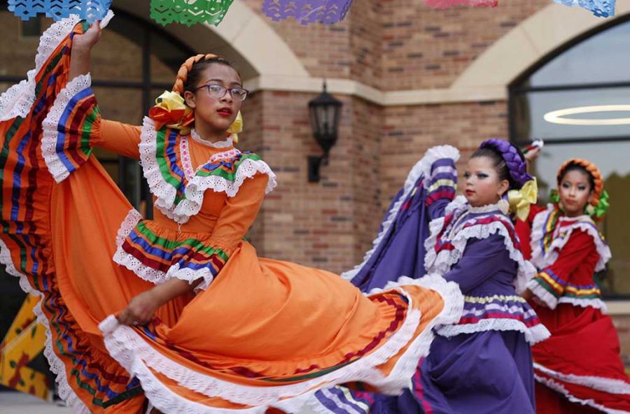 Zavala International Dancers entertains MSU students while they enjoy their traditional tacos. photo by Shea James