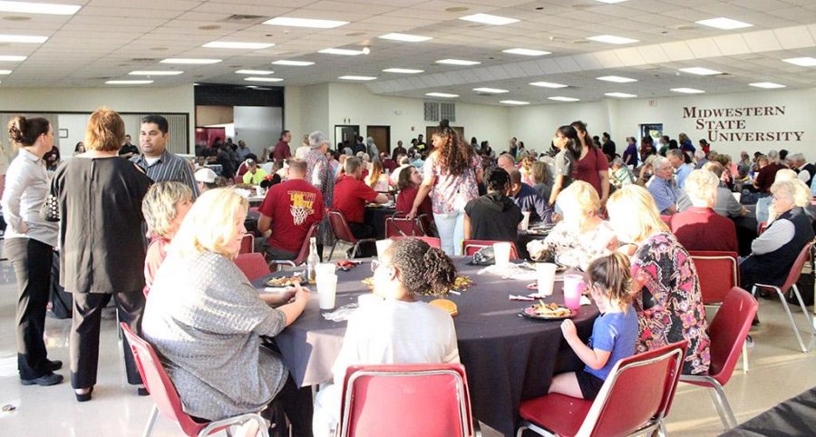 People sit down to enjoy their food at the Homecoming Fish Fry at Sikes Center, Friday OCt. 20, 2017. Photo by Rachel Johnson
