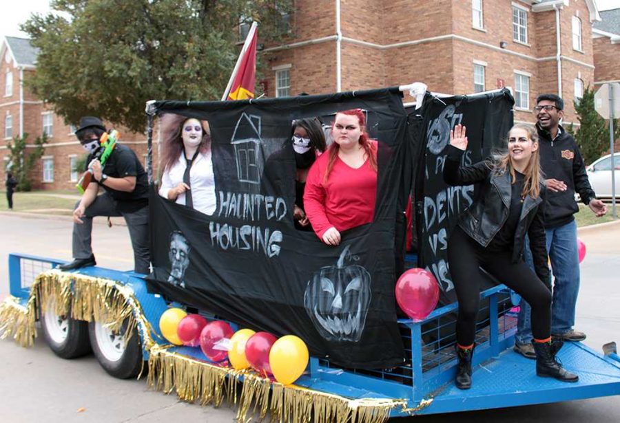 Residence Hall Association members on the Haunted Housing float during  the homecoming parade competition on Oct. 31, 2015. File photo by Kayla White
