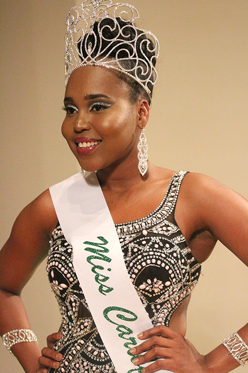 Beyandra Blanchard, radiology sophmore, pose for pictures at the end of the Mr. and Miss Caribfest Pagaent in the Akin Auditorium Sept. 28, where she won 2017 Miss Caribfest. Photo by Marissa Daley