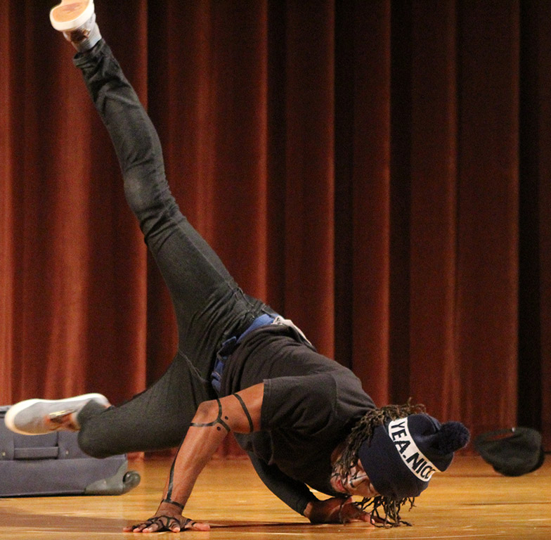 Edward Collins, psychology freshman, shows his break dancing moves in the talent portion of the the 2017 Mr. and Mrs. Caribfest in Akin Auditorium on Sept 28. Photo by Marissa Daley